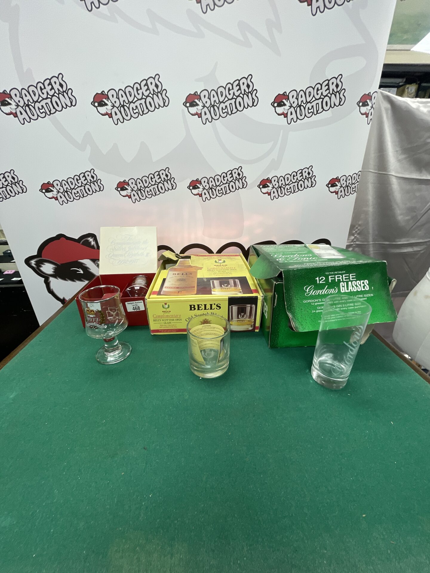 468 boxes of branded bell’s and gordon’s alcohol glasses with queens silver jubilee goblets
