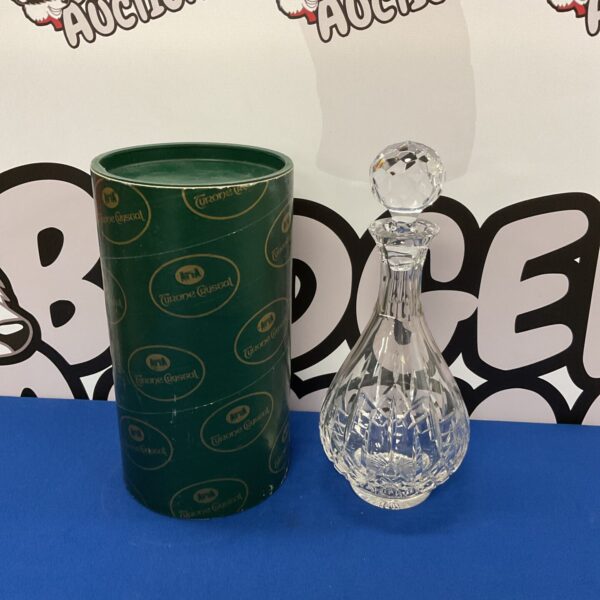 Boxed Tyrone crystal decanter with faceted design.