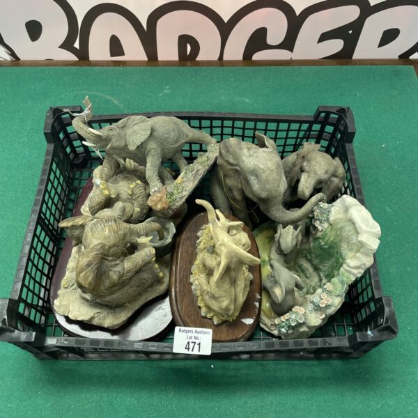 Lot of six elephant garden ornaments for outdoor display.