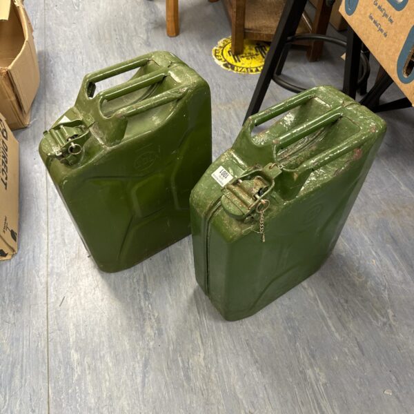 Vintage metal jerry cans, 20 litre fuel containers, collectible surplus.