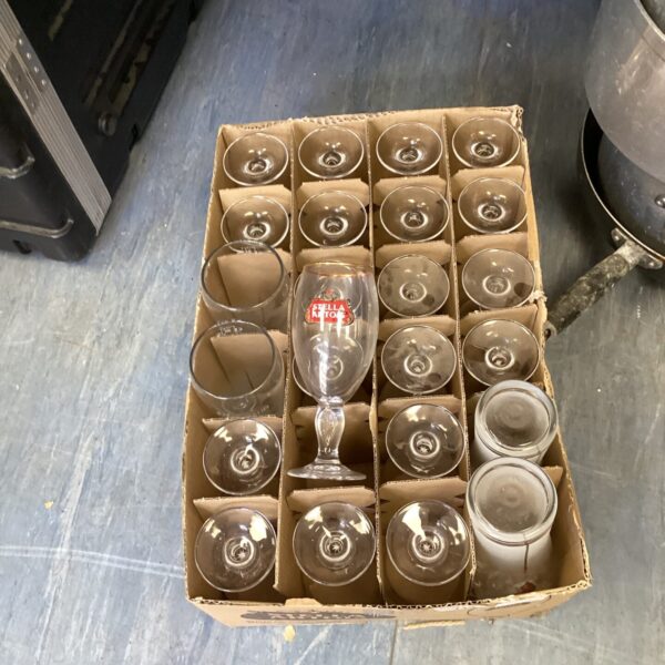 Lot of Stella Artois half pint glasses for sale.