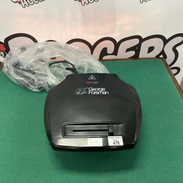 Vintage George Foreman Grill GFG201 kitchen appliance for cooking.