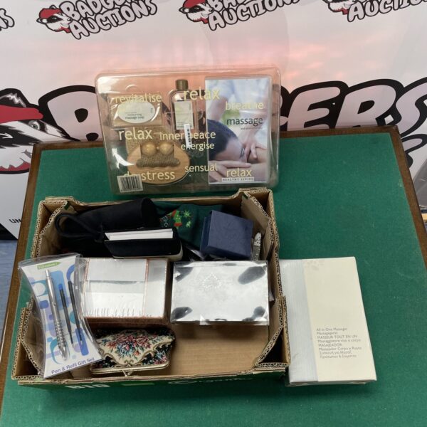 Mixed lot featuring a relaxation massager in original packaging.
