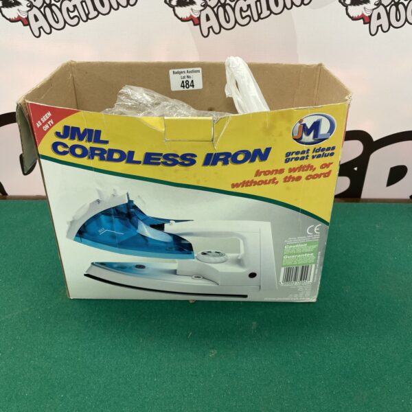 Vintage JML cordless iron, side view, household appliance.