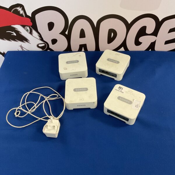 Lot of four Sonos Bridge wireless extenders for home audio.