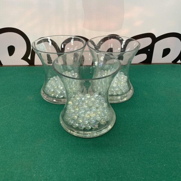 Clear glass vase set with decorative glass balls inside.