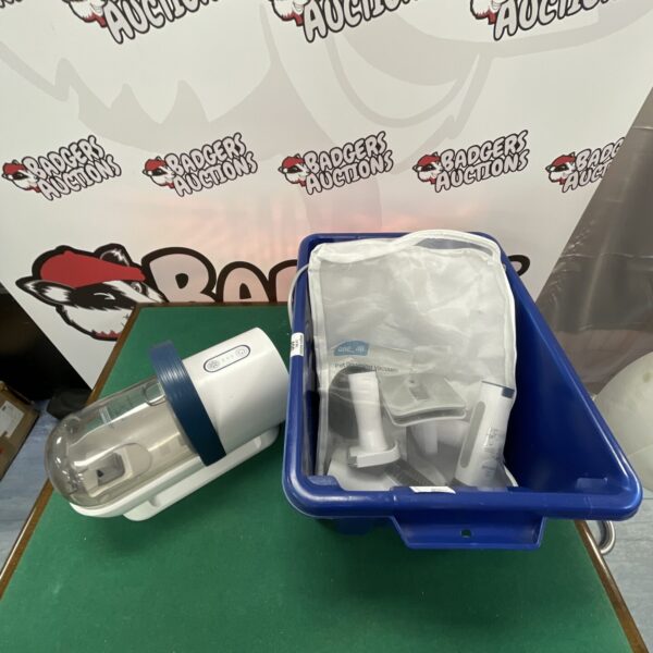 One All handheld pet grooming vacuum for removing animal hair.