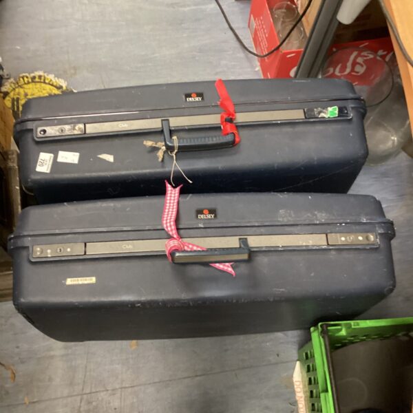Pair of vintage Desley suitcases, classic retro travel luggage.