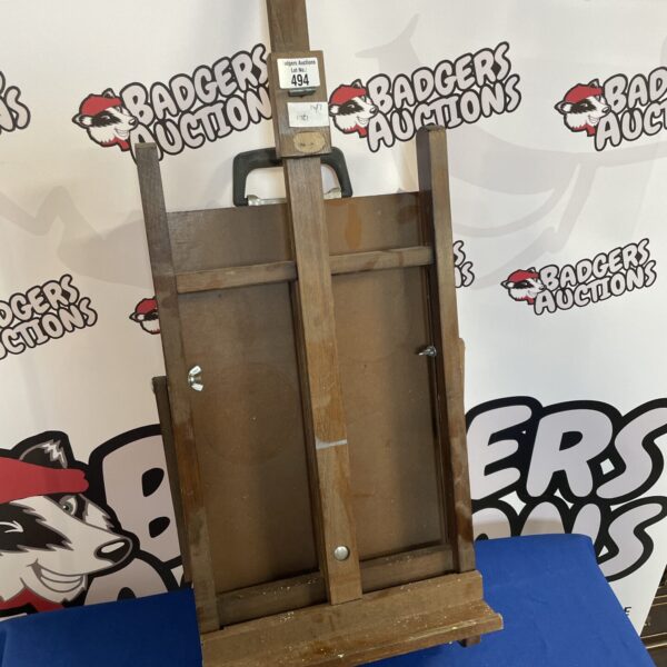 Vintage wooden artist easel for studio painting.