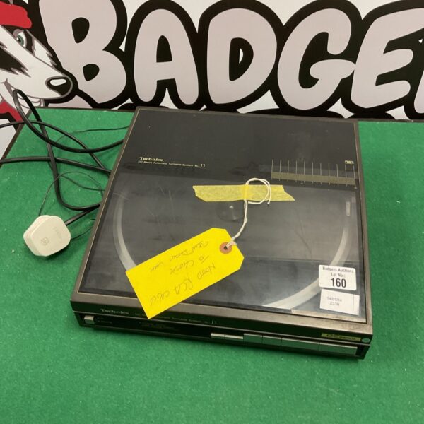 Vintage Technics SL-J1 turntable in as-found condition.