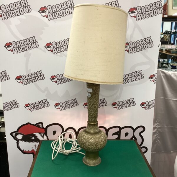 Intricate vintage Indian brass table lamp with detailed design.