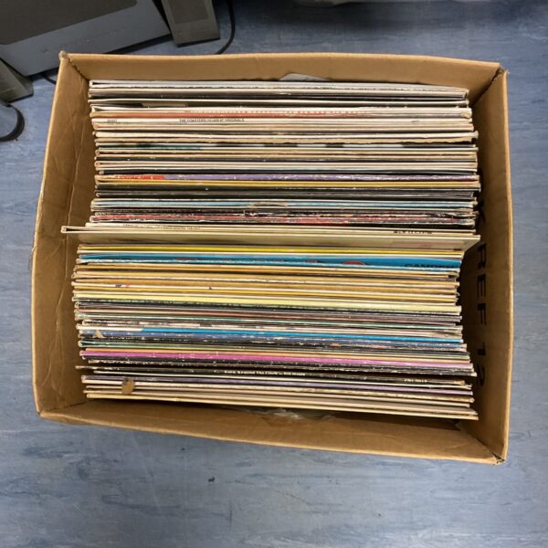 Box of vintage vinyl records including Diana Ross and Bill Haley.