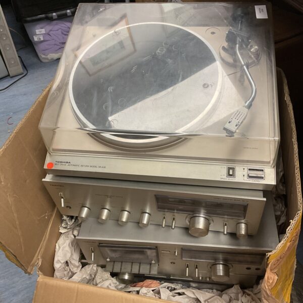 Side view of vintage Toshiba turntable record player.