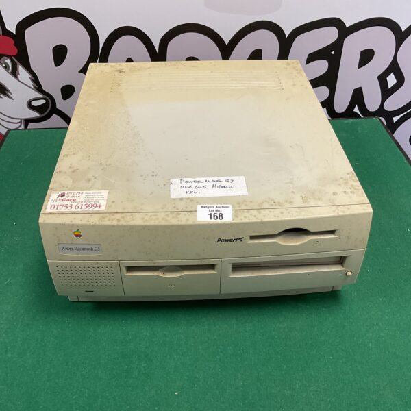 Vintage Apple Power Macintosh G3 desktop computer in translucent blue.