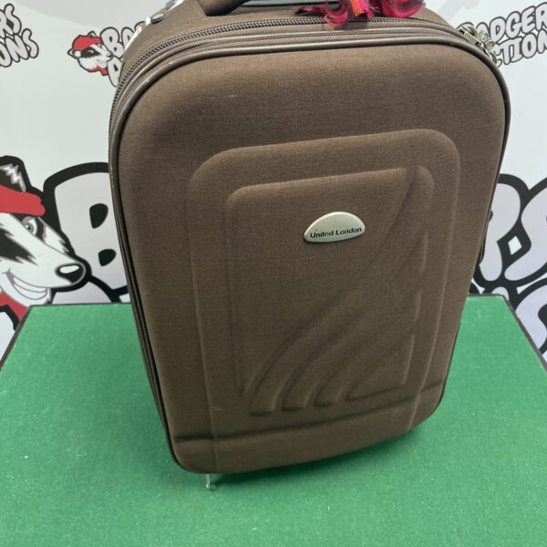 Vintage brown United London suitcase, classic travel luggage.