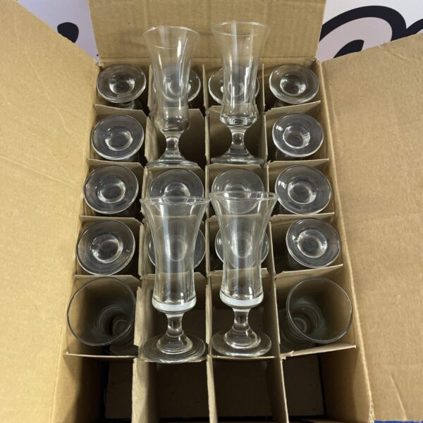 Lot of vintage Elgin sherry glasses on display.