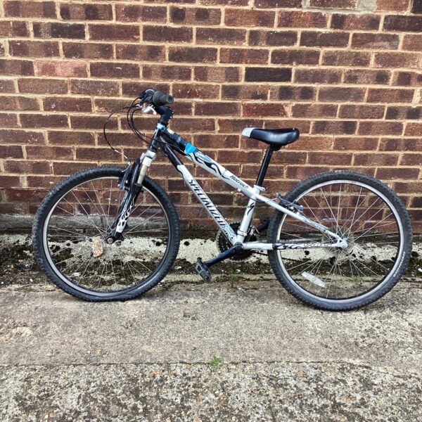 Side view of a vintage Specialized Hotrock mountain bike.