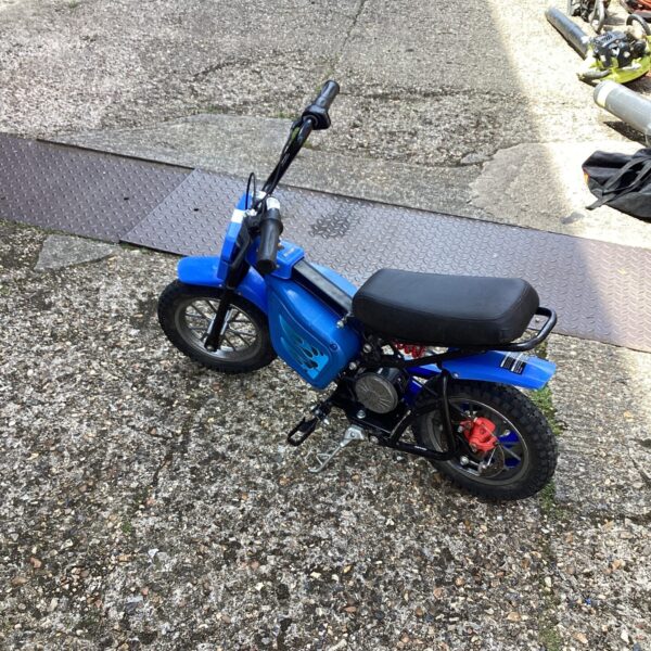 Blue child's electric motorbike, a fun ride-on toy.