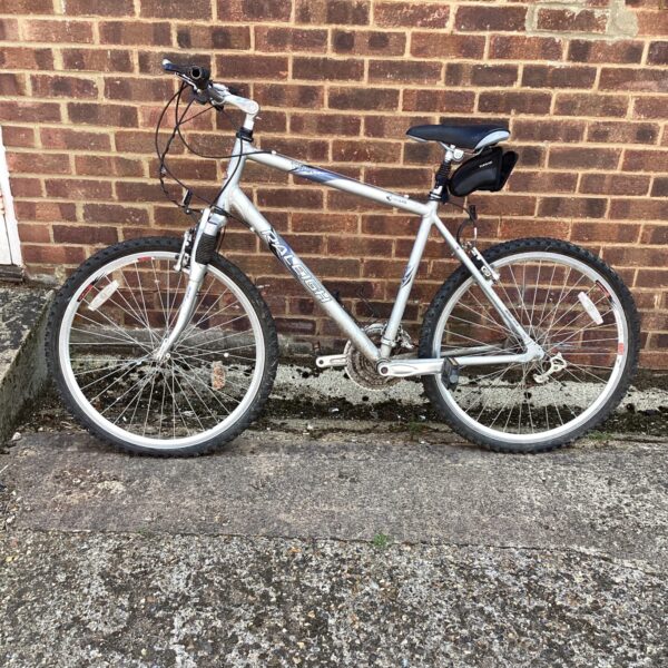 Side view of a vintage Raleigh Voyager mountain bike.