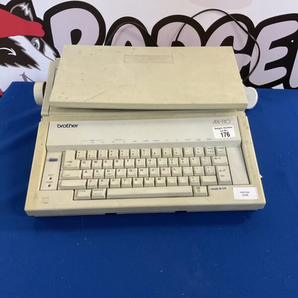 Vintage Brother AX-110 electronic typewriter, retro office equipment.
