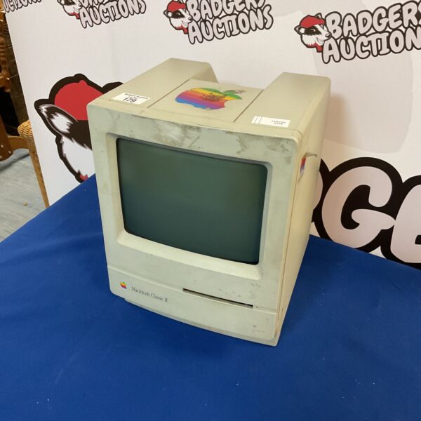 Vintage Apple Macintosh Classic II desktop computer, side view.