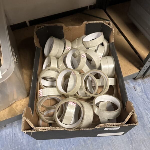 Lot of clear packing tape rolls for shipping and packaging.