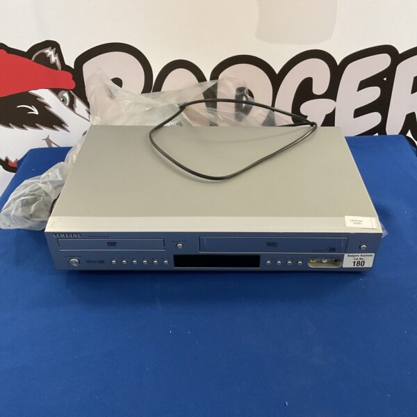 Silver Samsung DVD/VHS player for retro home entertainment.