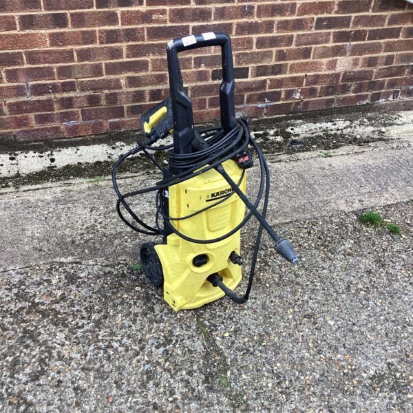 Used Karcher K4 pressure washer for garden and patio cleaning.