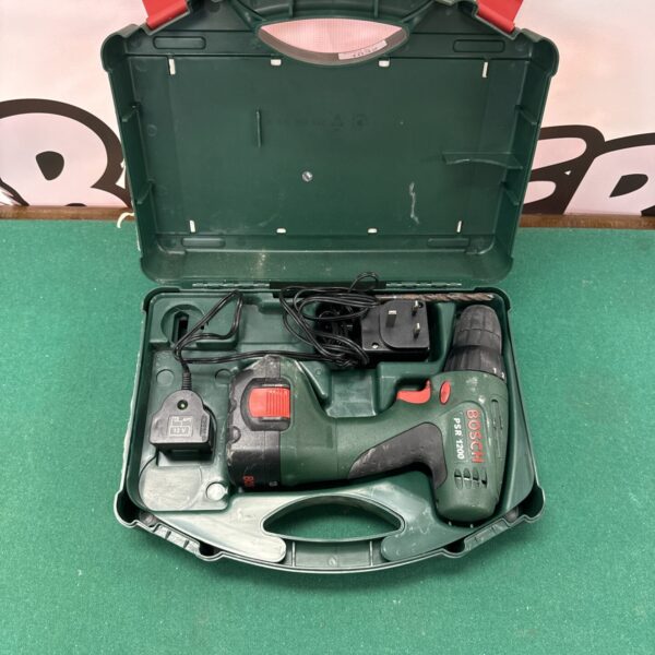 Bosch PSR 1200 cordless drill with charger, open case view.