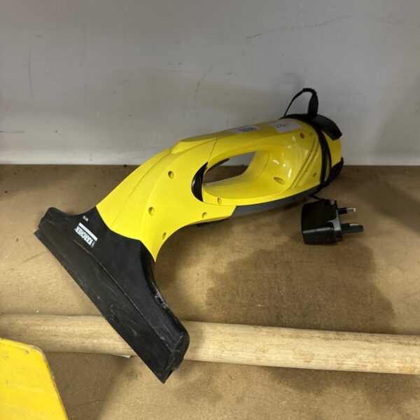 Karcher WV50 window vacuum cleaner with charger.
