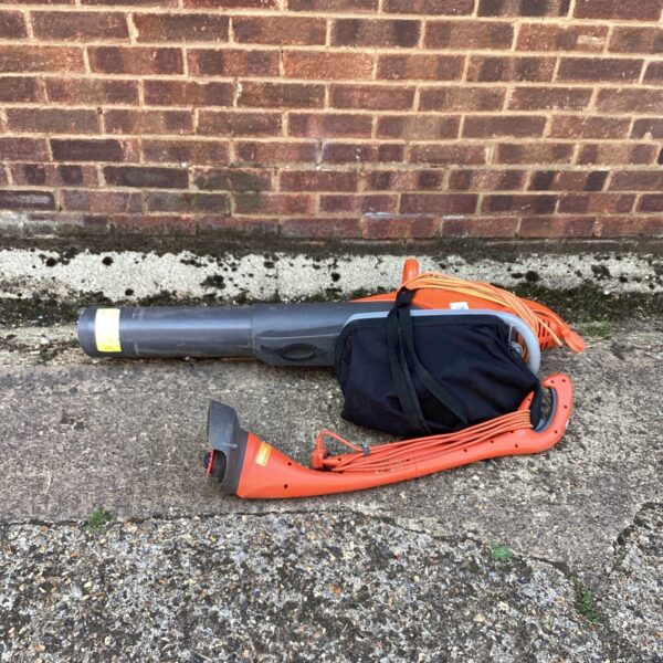 Flymo electric lawn vac and strimmer garden tool.