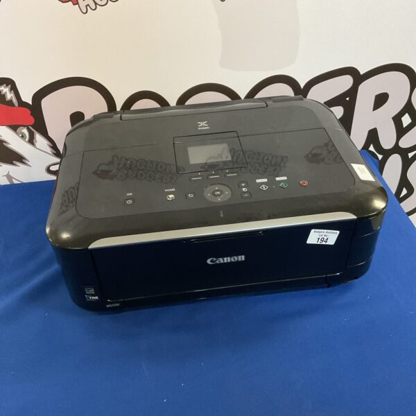 Front view of a Canon Pixma multifunction printer in used condition.