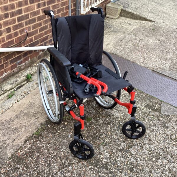 Black and silver Bastide folding wheelchair, a portable mobility aid.