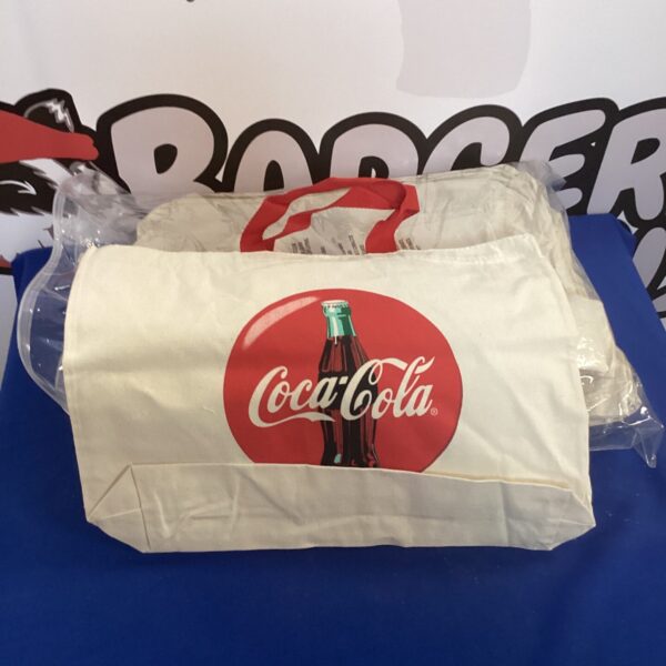 Vintage Coca Cola canvas bag with classic logo.