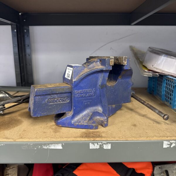 Vintage Record 1 ton bench vice, a robust metalworking tool.
