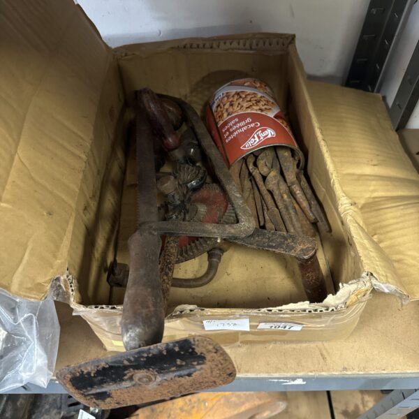 Vintage tool collection featuring a hammer and chisel.