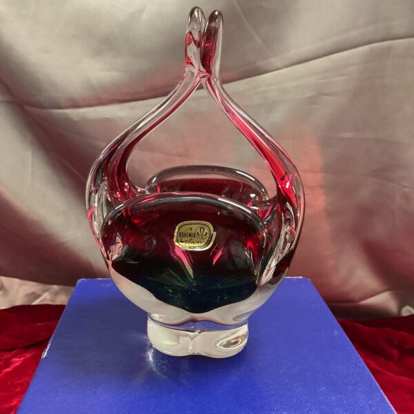 Stunning vintage Bohemian cranberry glass basket vase for collectors.