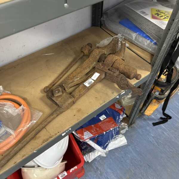 Large vintage blacksmith vice with heavy cast iron jaws.