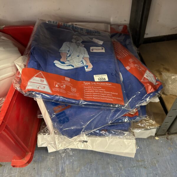 Sealed pack of disposable type 5/6 boiler suits for protective workwear.