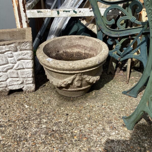 Large garden stone effect pot for outdoor plants and decor.