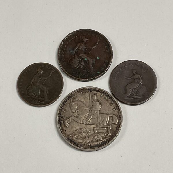 Antique George III and IV pennies featuring Britannia design.