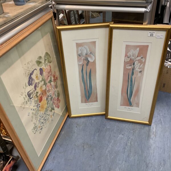 Three framed floral prints with elegant gilt frames for wall decor.