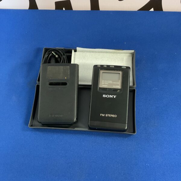 Vintage Sony AM FM radio in black plastic.