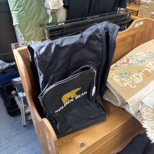 Black Golden Bear golf club travel bag with logo.