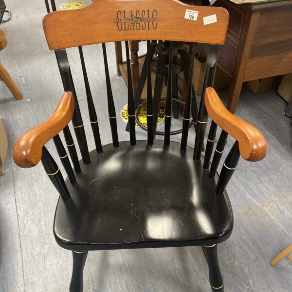 Vintage golf club chair with wooden construction and unique design.