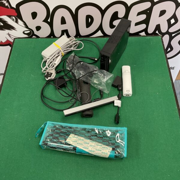 Nintendo Wii console RVL-401 with controller and cables for retro gaming.