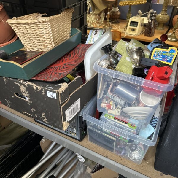 Mixed house clearance lot with various household items and storage containers.