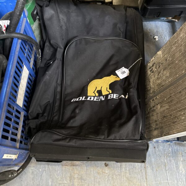 Black Golden Bear golf travel bag for club protection.