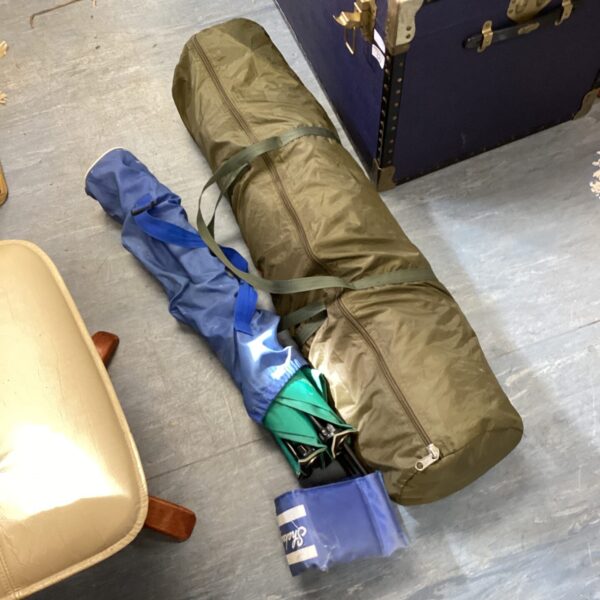 Bundled carp fishing bivvy and Shakespeare folding chair for angling.