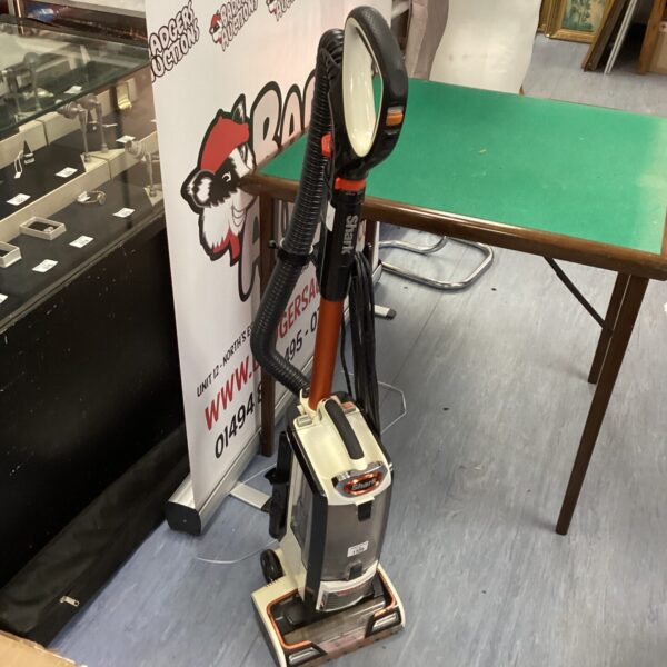 Upright Shark vacuum cleaner in used condition.